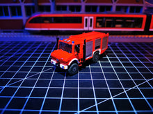 Lade das Bild in den Galerie-Viewer, Feuerwehr Unimog Spur TT 1:120

